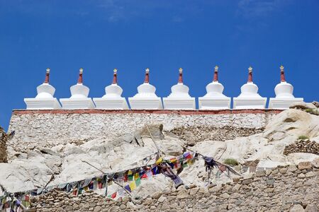 Stupas at the Shey Monastery on a hilllock in Shey, 15 km south of Leh in Ladakh, overlooking the valley.の写真素材