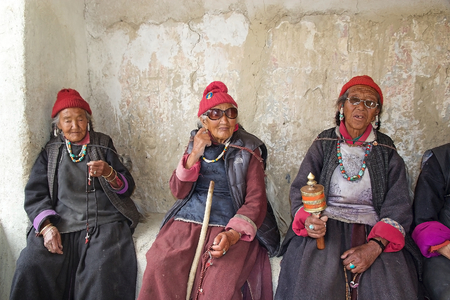 Ladakhi women in traditional clothes at the Lamayuru Monastery in Ladakh, India.のeditorial素材