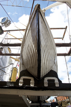 Lifeboat on the Frigate ARA Presidente Sarmiento in Puerto Madero, Buenos Aires, Argentina. The ship was originally built for the Argentina Naval Academy. It is now mainteined in its original 1898 appearance as a museum ship.の写真素材