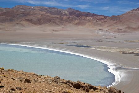 Diamond Lagoon in the Cerro Galan, a caldera in the Catamarca Province, Puna, Argentina. Cerro Galan is one of the largest exposed caldera in the world. It is part of the Central Volcanioc Zone of the Andes.の写真素材