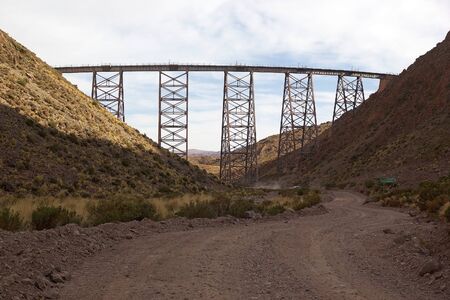 La Polvorilla viaduct in Salta Province at the Puna de Atacama, Argentina. The viaduct is run by the Train to the Clouds, a tourist train service in the Andes mountain range, over 4200 mの写真素材