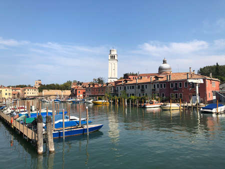 Buildings along the canal in Venice, a city in northeastern of Italy and the capital of the Veneto region. It is situated on a group of small 118 islands that are separated by canals and linked by over 400 bridgesのeditorial素材