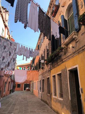 Urban street in Venice, a city in northeastern of Italy and the capital of the Veneto regionのeditorial素材