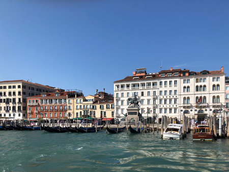 Buildings along the canal in Venice, a city in northeastern of Italy and the capital of the Veneto region. It is situated on a group of small 118 islands that are separated by canals and linked by over 400 bridgesのeditorial素材