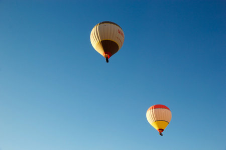 Cappadocia hot air balloon trip, Turkey. Hot air balloons are flying over Cappadociaの写真素材
