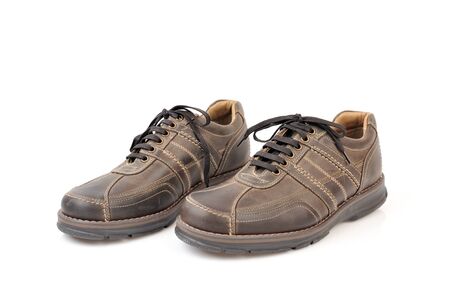 Pair of brown shoes isolated on whiteの写真素材