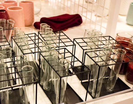 A few racks with scientific test tubes in a store in Haarlem.