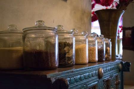 Cool Glass Jars in an maroccan restaurant with al kinds of herbs in it.