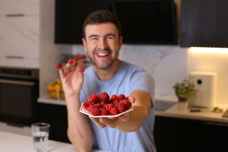 Man enjoying a plate of fresh framboise