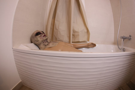 Spooky alien in the bathtubの写真素材