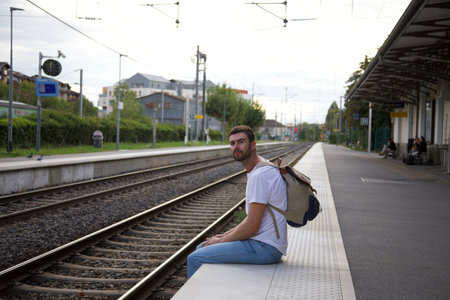 Man stranded at train stationの写真素材
