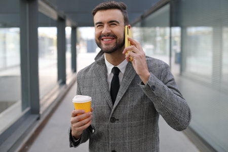 Businessman calling from the airportの写真素材