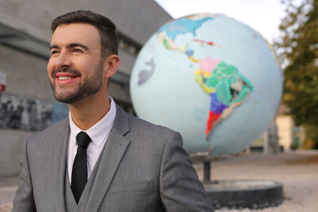 Conscious entrepreneur with the planet on the backgroundの写真素材