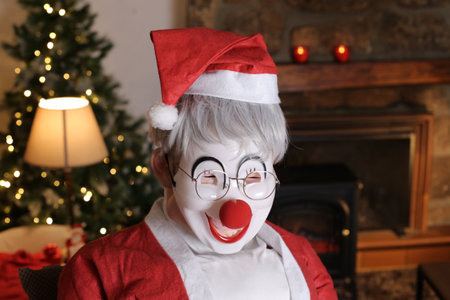 Weird looking clown dressed as Santa Claus for Christmas timeの写真素材