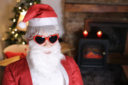 Cool Santa wearing heart shaped eyeglassesの写真素材