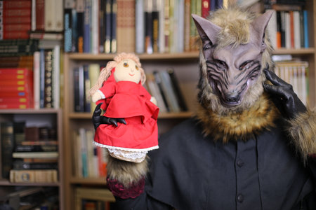 Wolf holding little red riding hood themed dollの写真素材