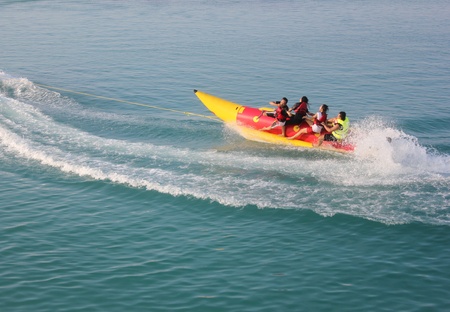 Jakarta, Indonesia, March 31, 2012 - Boating by banana boat at the sea of Tidung Island.のeditorial素材