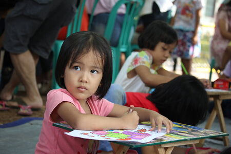 Children follow a drawing competition in Depok, West Java, Indonesia, 24 August 2014のeditorial素材