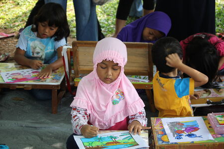 Children follow a drawing competition in Depok, West Java, Indonesia, 24 August 2014のeditorial素材