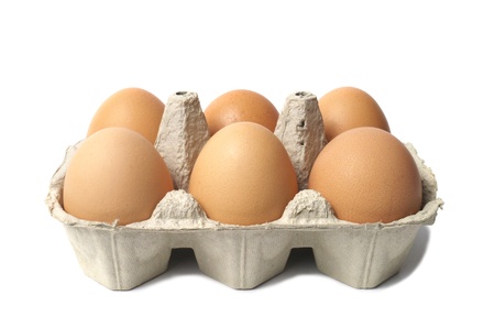 Six eggs in container isolated on white background