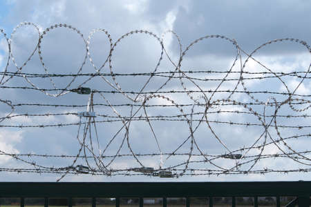 Restricted area - fence with barbed wire