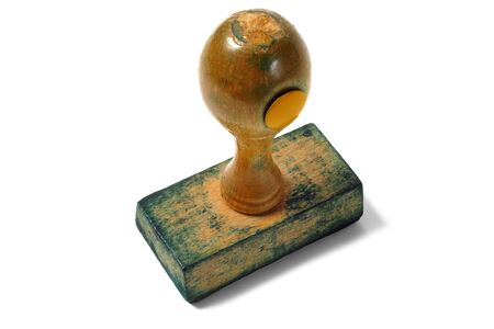 Old rubber stamp isolated on whiteの写真素材