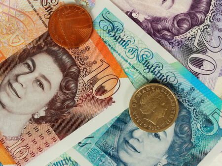 Macro of British bank notes and coins