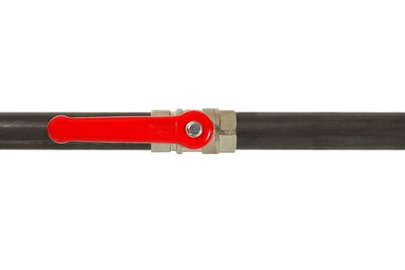 Pipe and open valve with red handle isolated on white backgroundの写真素材