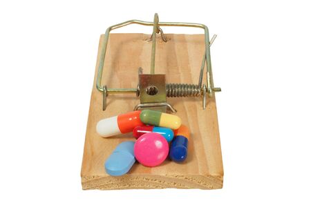 Mousetrap with medicine isolated on white backgroundの写真素材