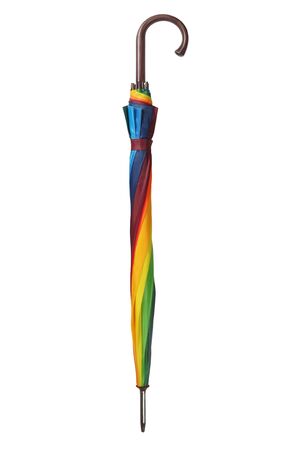 Folded rainbow umbrella isolated on white backgroundの写真素材
