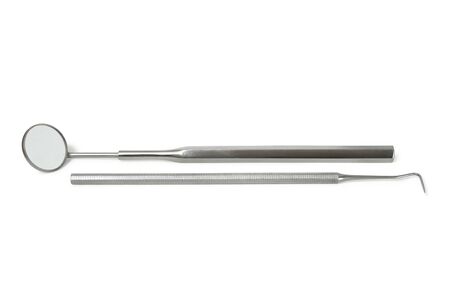 Two dental tools isolated on white backgroundの写真素材