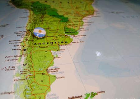 Drawing pin flag of Argentina on the map. High quality photo