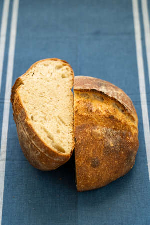Homemade boule (round loaf) of freshly baked sourdough bread