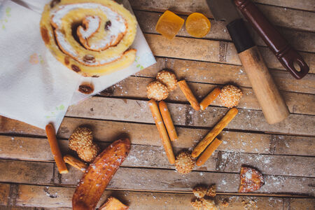 biscuits cake  lying on a brown board rustic heart shaped breakfast for Valentine's Day for lovers.の写真素材