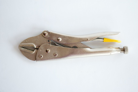 Metal locking plier jaw on white background.の写真素材