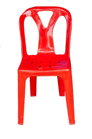 Red plastic chairs, a white backgroundの写真素材