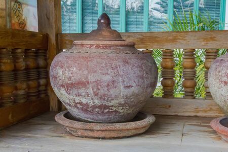 Clay pot on drinking water is the Thai way of life の写真素材