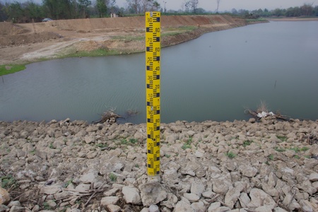 Measure the water level in the dam の写真素材