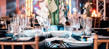 Luxury catering and service. Wedding or anniversary. Banquet. table served with cutlery, flowers,...