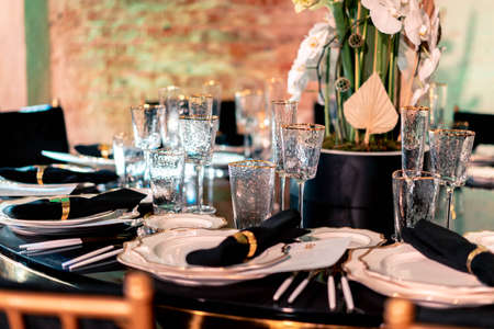Luxury catering and service. Wedding or anniversary. Banquet. table served with cutlery, flowers,...