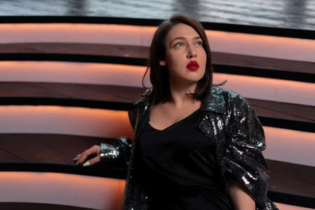 Jazz Singer On Stage At Dress Rehearsal Or After Performance Under Spotlight.の写真素材