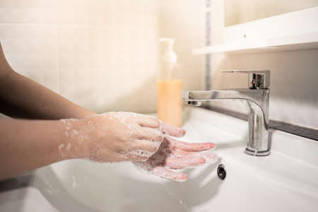 Washing hands rubbing with soap for virus prevention, hygiene to stop spreading the virus.の写真素材