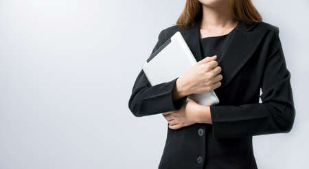 Business people use technology tablet for working isolate in soft grey background.の写真素材