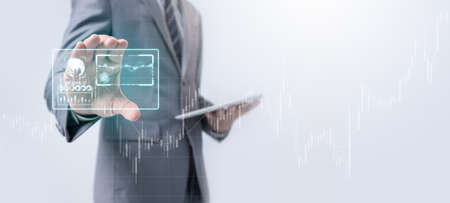 Businessman use tablet for analysis trend graph interface. Business strategy.の写真素材