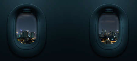 Night cityscape from airplane two window, Travel and tourism concept.の写真素材