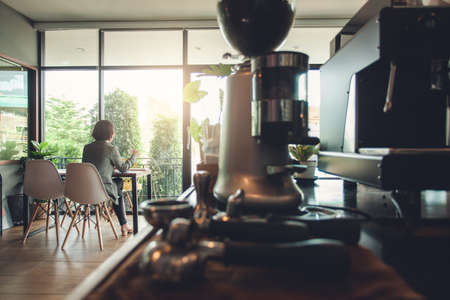 Coffee shop have businesswoman drinking coffee at the table on the morning.の写真素材