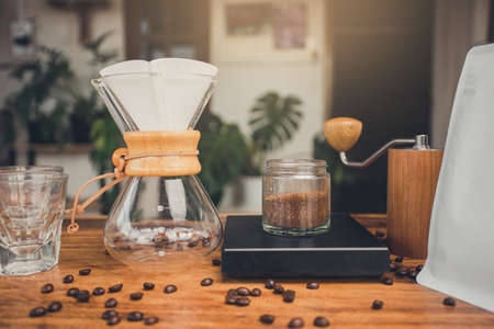 Weigh out the coffee powder on scales. The process of making drip coffee.の写真素材