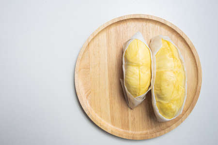 Fresh durian on dish wooden. Durian king of fruit. Tropical fruit.