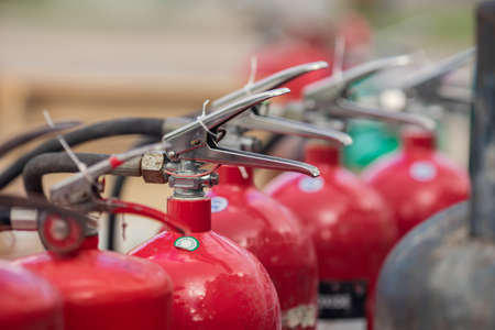 Red tank fire extinguisher. Emergency fire extinguisher gas carbon dioxide in side equipment for industrial refinery crude oil and gas.の写真素材