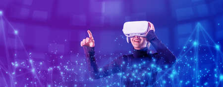 Asian woman wearing VR headset for entertainment in the metaverse. Augmented reality. Future digital...